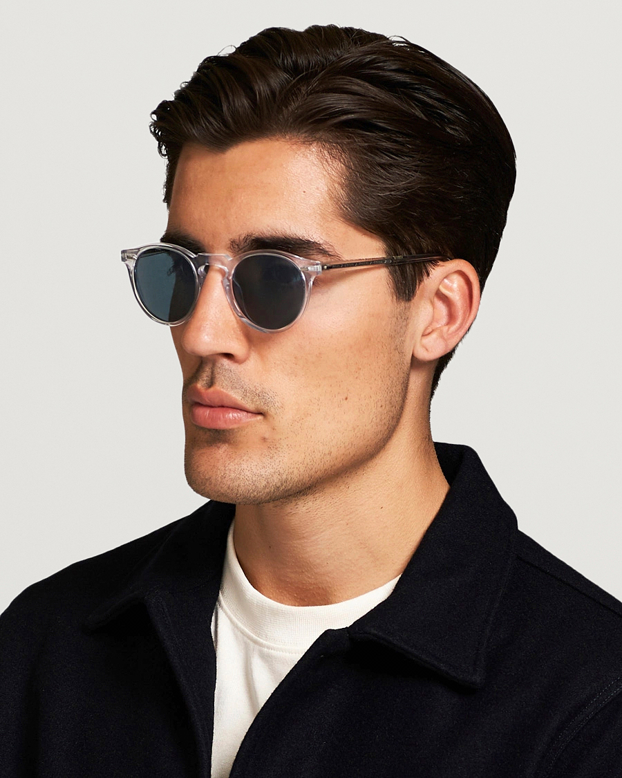 Uomini |  | Oliver Peoples | Gregory Peck Sunglasses Crystal/Indigo Photochromic