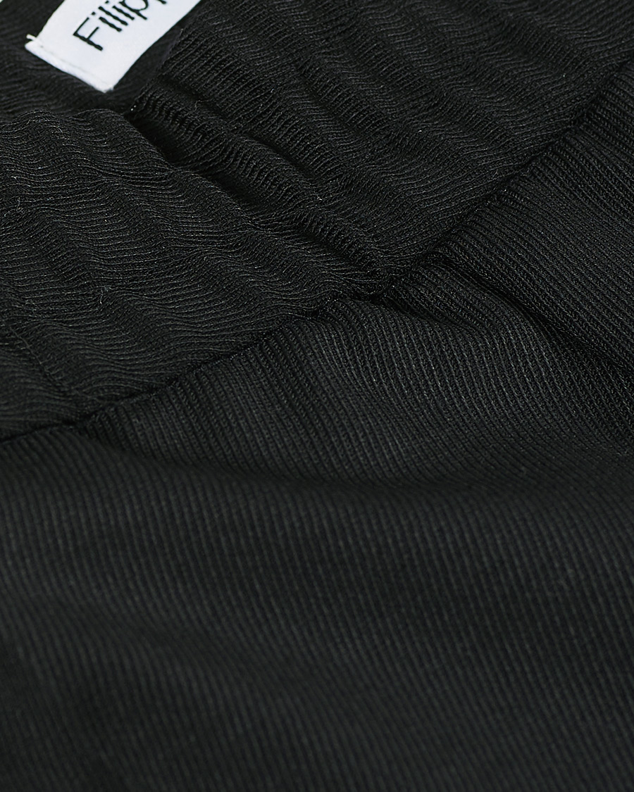Uomini | Pantaloni | Filippa K | Terry Gabardine Cropped Turn Up Trousers Black