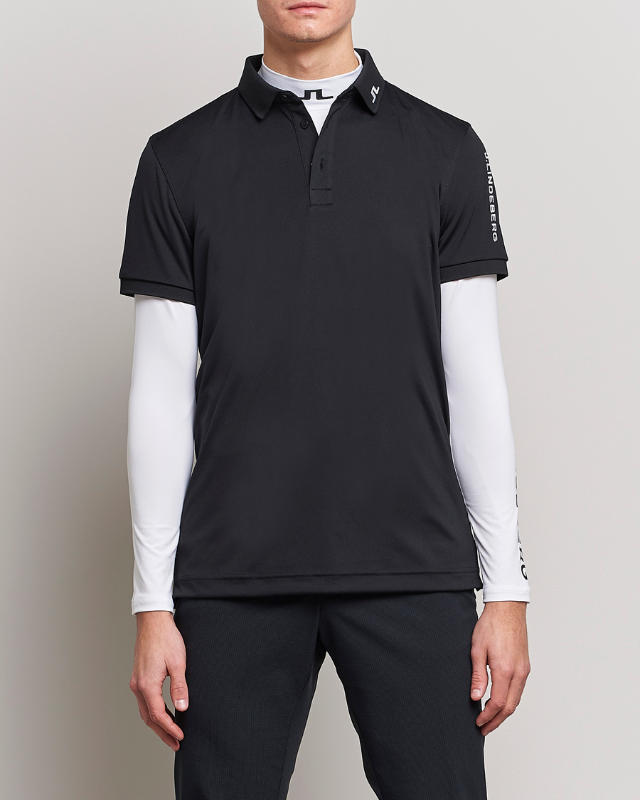 Uomini |  | J.Lindeberg | Regular Fit Tour Tech Stretch Polo Black