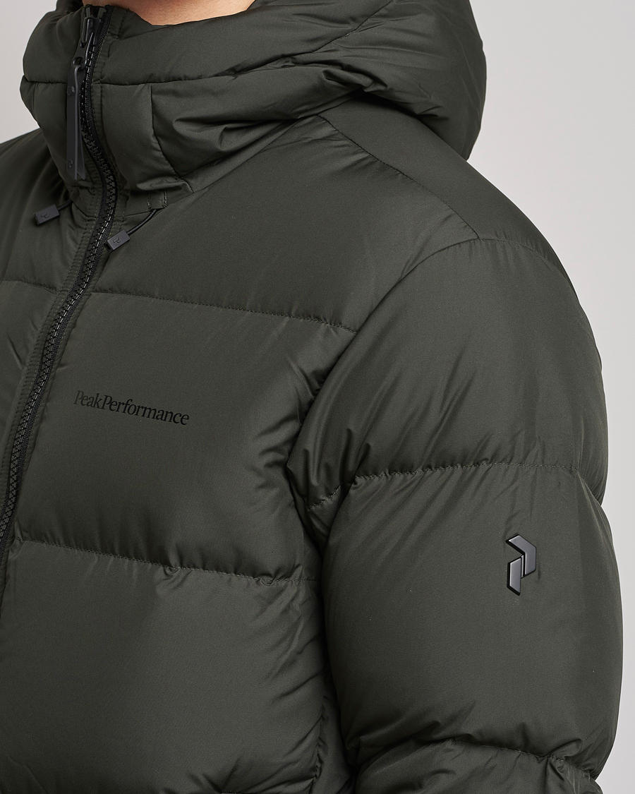 Uomini | Giacche | Peak Performance | Rivel Down Hooded Jacket Olive Extreme