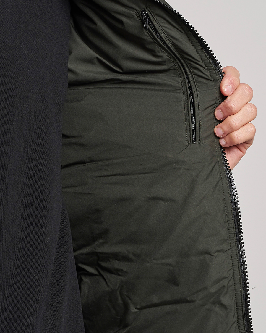 Uomini | Giacche | Peak Performance | Rivel Down Hooded Jacket Olive Extreme
