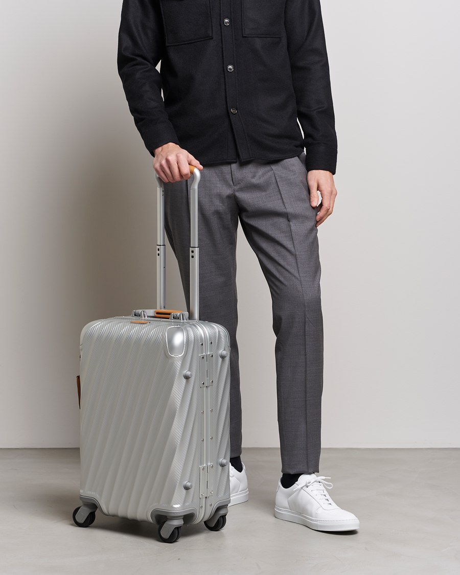 Uomini |  | TUMI | International Carry-on Aluminum Trolley Texture Silver