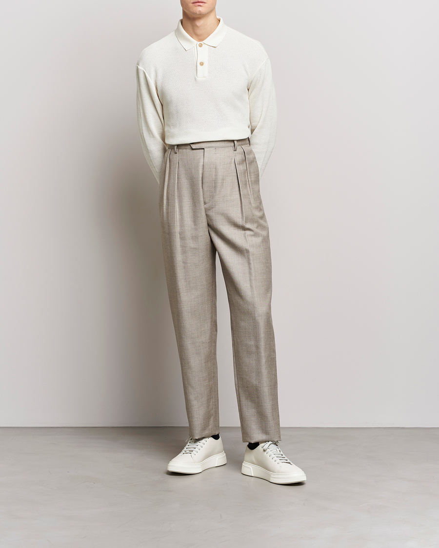 Uomini | Pantaloni | Giorgio Armani | Pleated Wool Trousers Light Grey