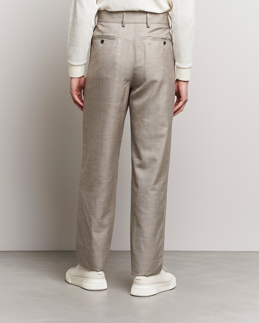 Uomini | Pantaloni | Giorgio Armani | Pleated Wool Trousers Light Grey