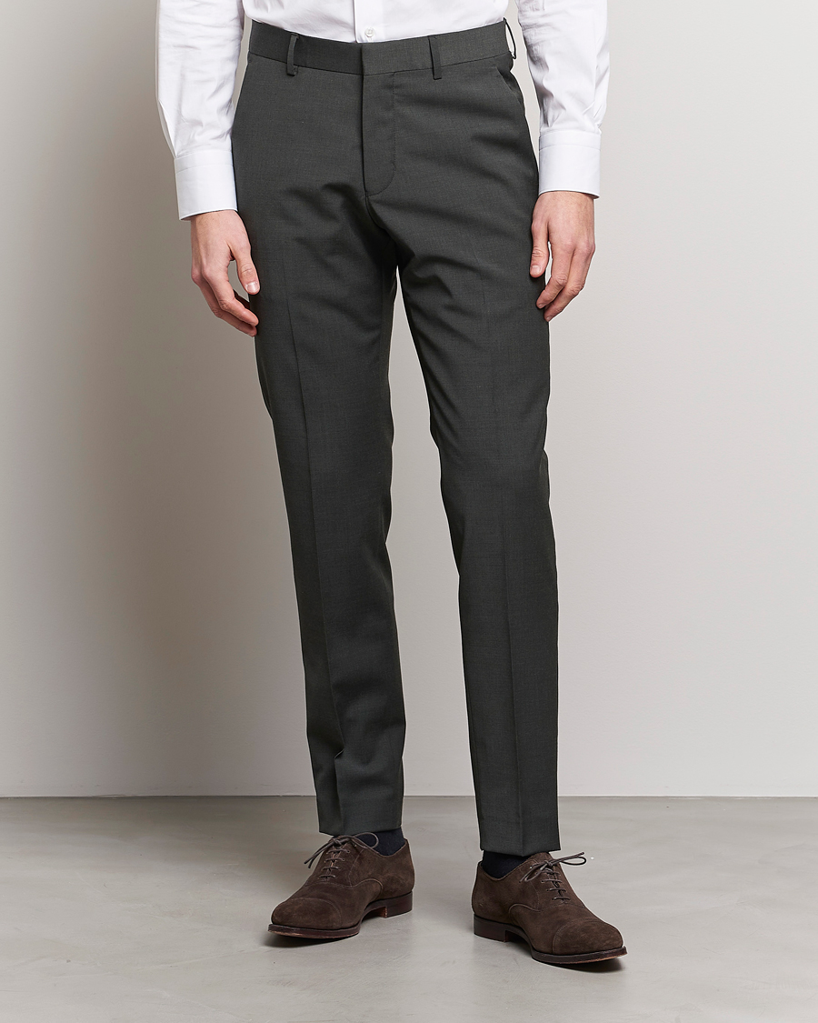 Uomini | Pantaloni da abito | Tiger of Sweden | Tenuta Wool Travel Suit Trousers Olive Extreme