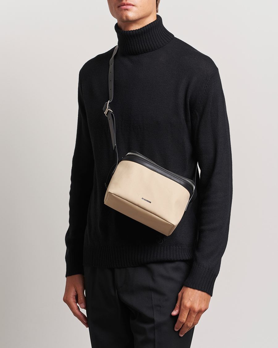 Uomini |  | Jil Sander | Virgil Wool Roll Neck Sweater Black