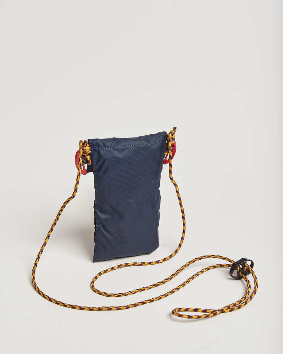 Uomini |  | Klättermusen | Algir Lanyard Pocket Bag Indigo Blue