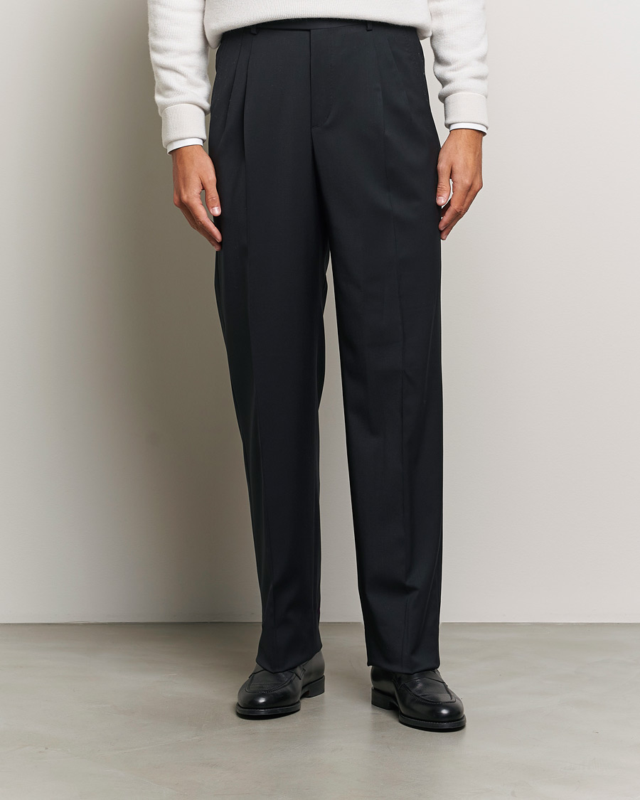 Uomini | Abbigliamento | Brioni | Pleated Wool Trousers Navy