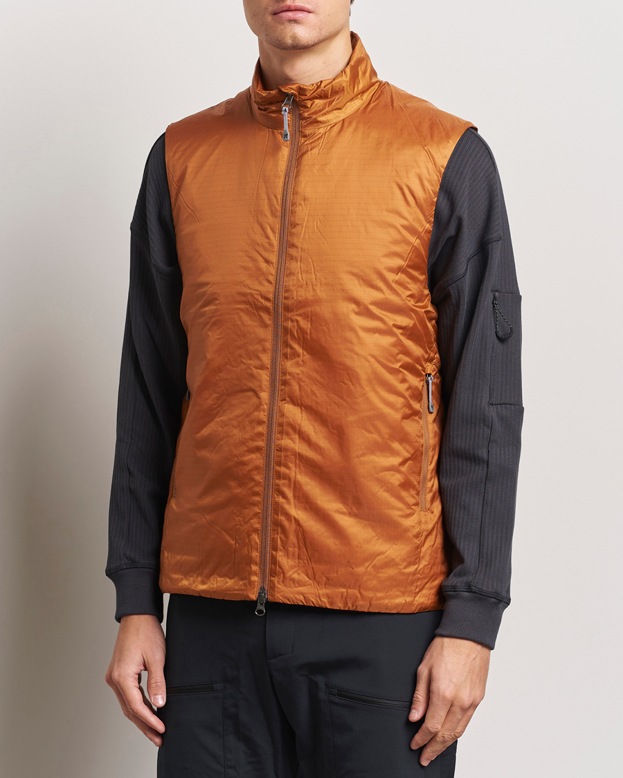 Uomini | Giacche da esterno | Houdini | Dunfri Primaloft Padded Vest Rust Brown