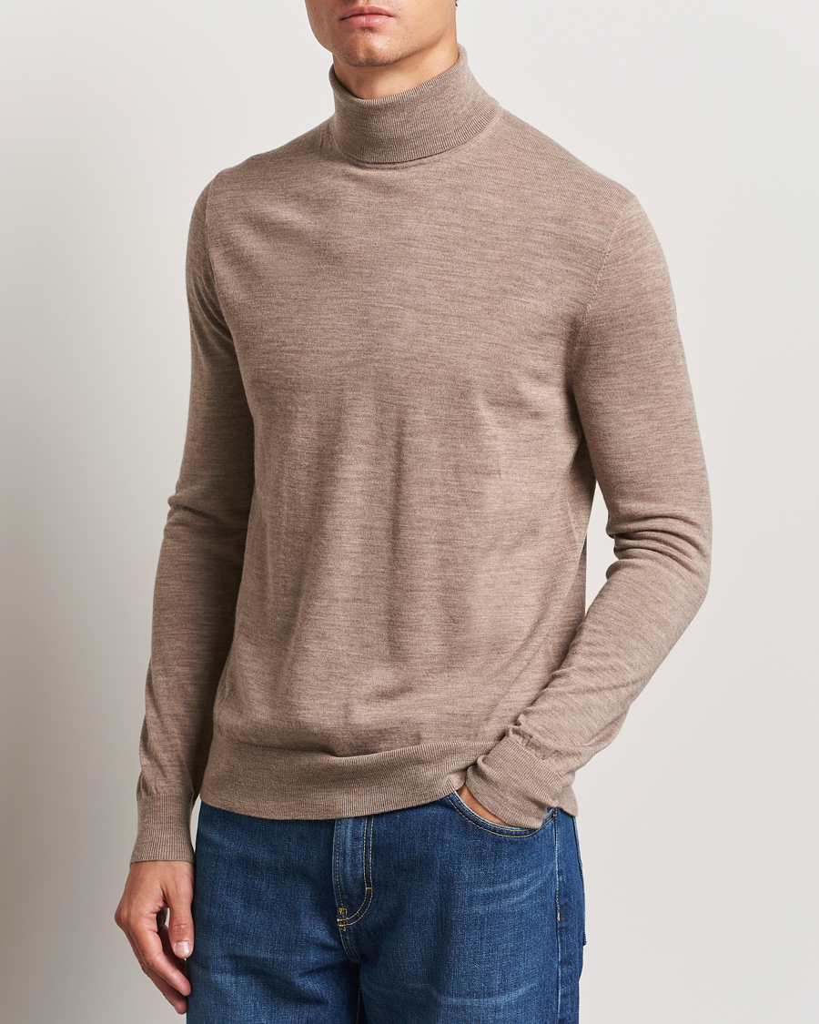 Uomini | Maglieria | Tiger of Sweden | Nevile Extra Fine Merino Polo Beige Melange