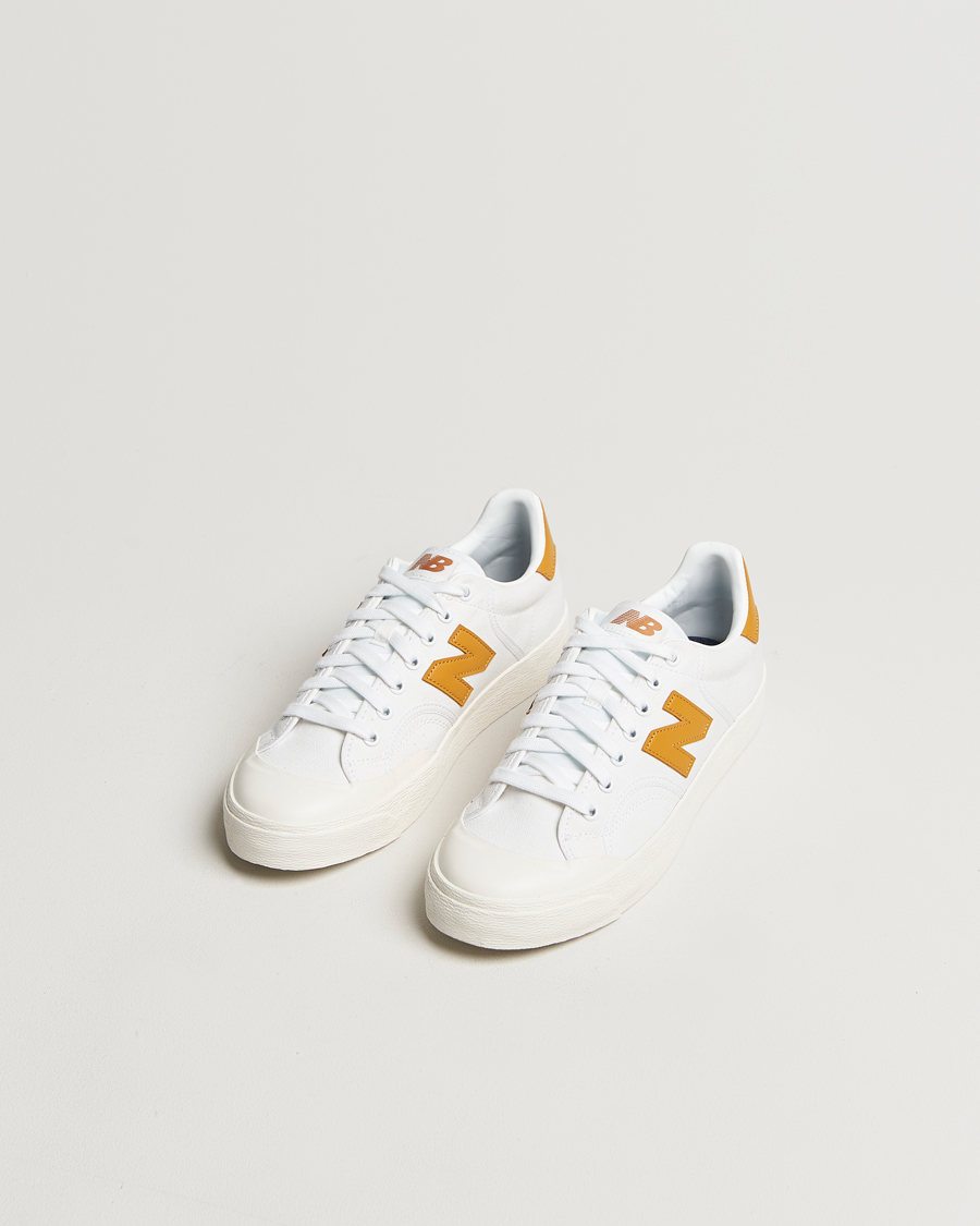 Uomini | Sneakers bianche | New Balance | B100 Sneakers White/Yellow